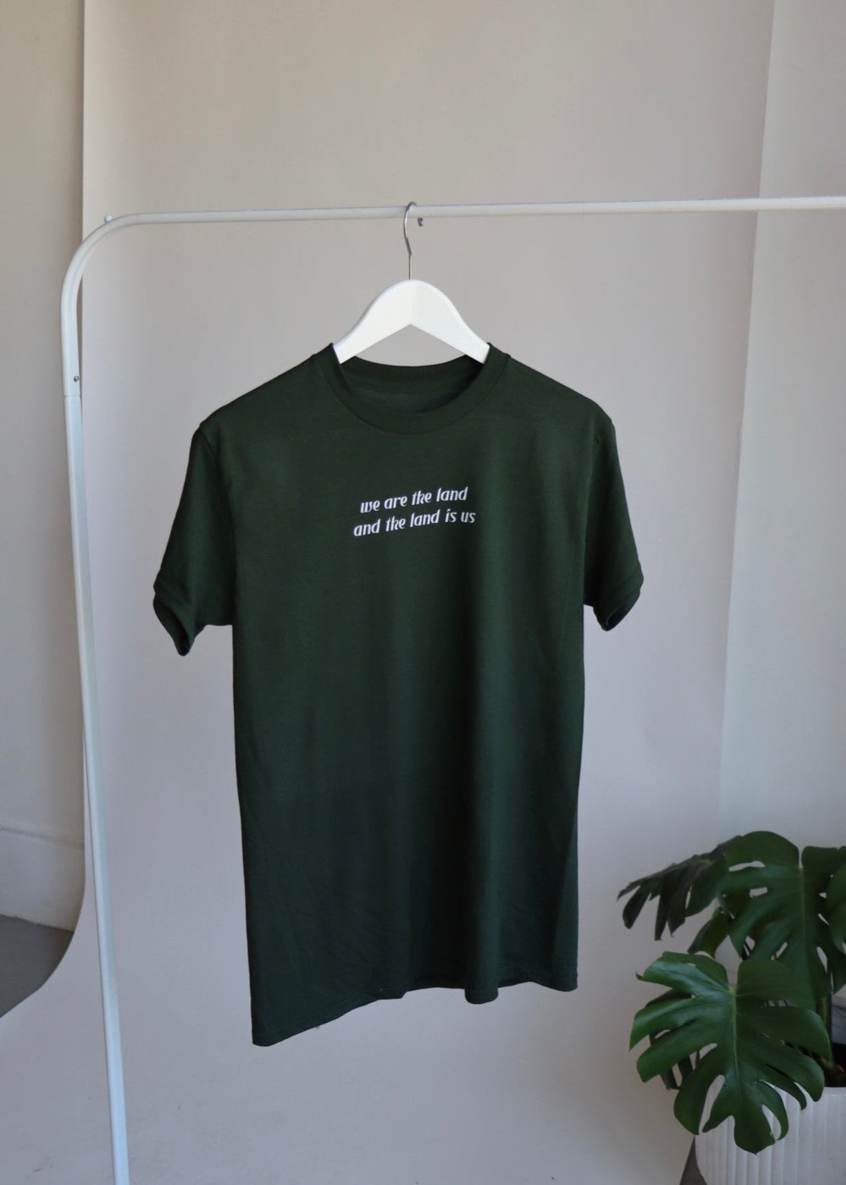 WE ARE THE LAND T-SHIRT FOREST GREEN